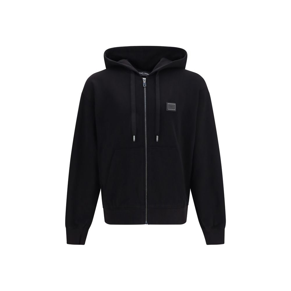 Sweatshirt Hoodie by Dolce & Gabbana for men in cotton satin black features a slouchy chic silhouette, detailed with a slouchy chic and a signature hooded neckline for an elevated aesthetic.