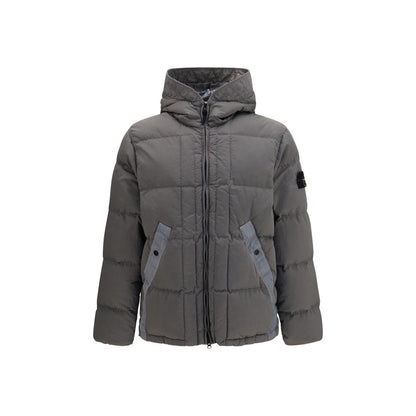 Hooded Puffer Jacket by Stone Island for men in nylon & duck-down bicolour features a dramatic silhouette, showcasing a sophisticated hooded neckline and distinctive pockets, hooded & insulated for a dramatic aesthetic.