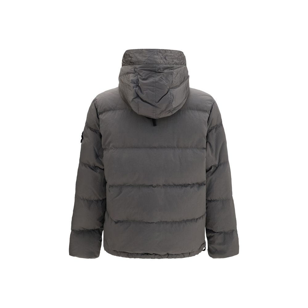 Hooded Puffer Jacket by Stone Island for men in nylon & duck-down bicolour presents a effortlessly chic silhouette, showcasing a sophisticated hooded neckline and premium pockets, hooded & insulated for a truly effortlessly chic finish.