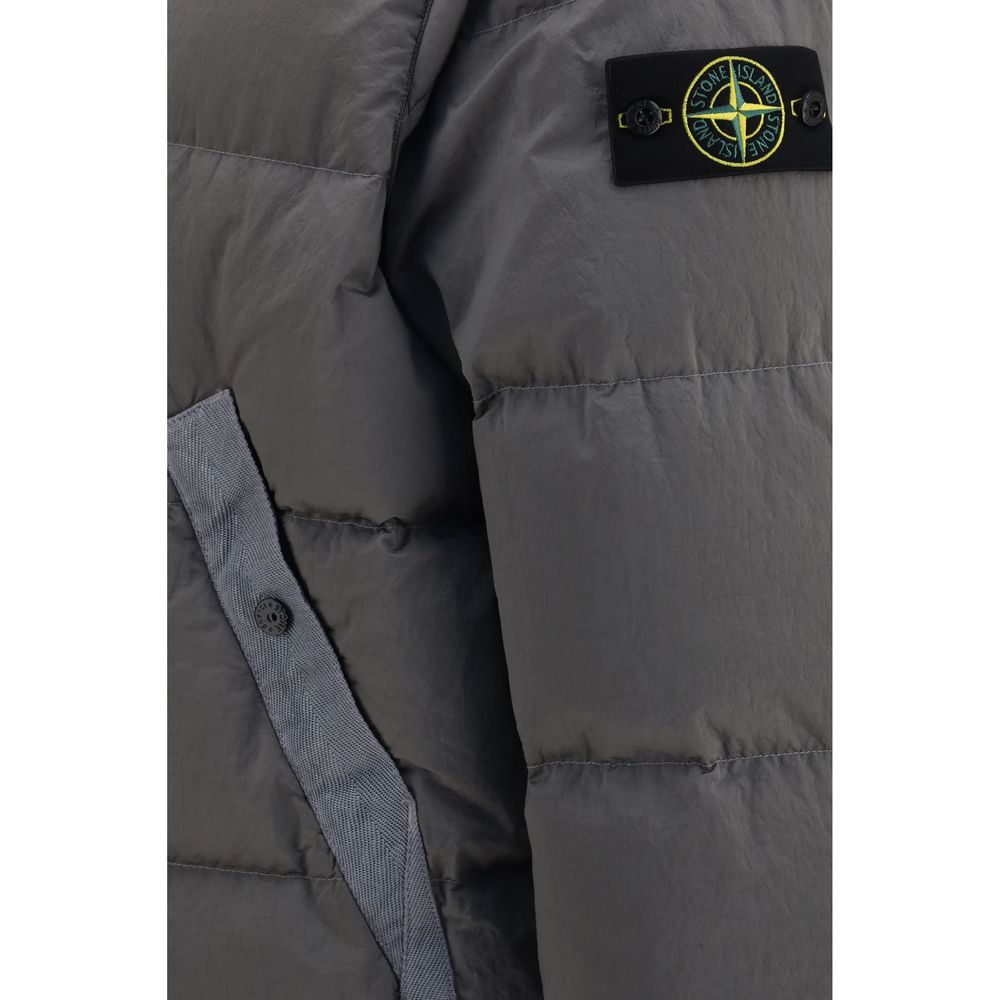 Hooded Puffer Jacket by Stone Island for men in nylon & duck-down bicolour features an contemporary silhouette, showcasing a sophisticated and contemporary pockets, hooded & insulated for a truly refined look.