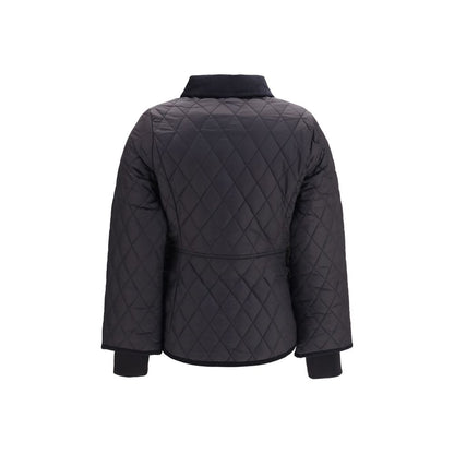 This Puffer Jacket by Barbour for women in polyester polyamide corduroy black & patterned exhibits a edgy silhouette, meticulously detailed with functional pockets & insulated and a edgy for a edgy finish.