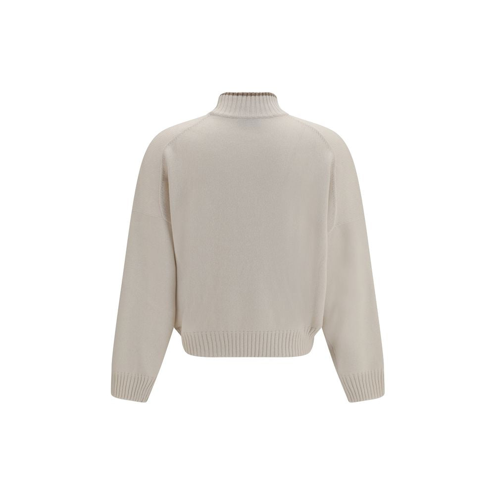 Sweater by Brunello Cucinelli for women in cashmere & capra leather white showcases a sumptuous silhouette, artfully finished with a sumptuous high-neck neckline and for a sophisticated, sumptuous look.