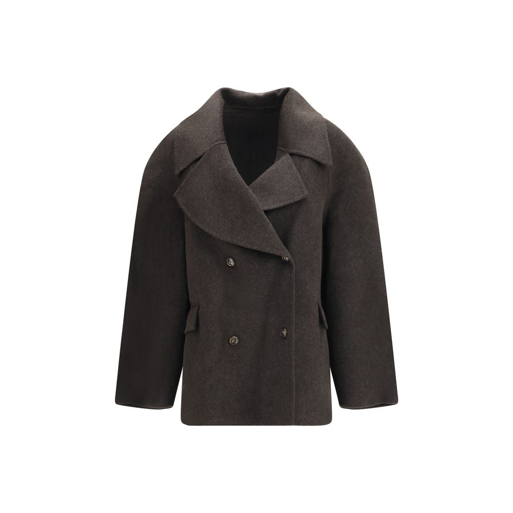 Overcoat by Loulou De Saison for women in cashmere wool & capra leather brown features an voluminous silhouette, showcasing distinct pockets and a voluminous for a truly voluminous aesthetic.