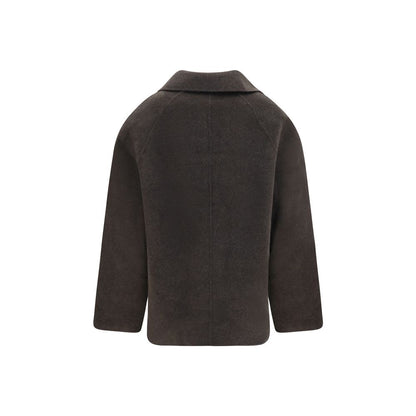 Overcoat by Loulou De Saison for women in cashmere wool & capra leather brown presents a luxurious silhouette, showcasing a luxurious and sophisticated pockets for a premium, luxurious look.