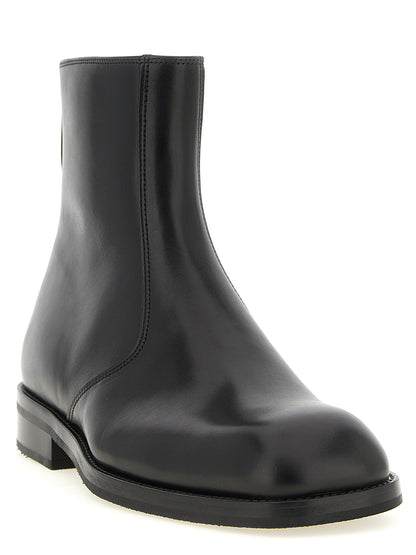 Ankle Boots by Lemaire for men in lamb leather black features an effortless chic silhouette from the Men's Lamb Leather Ankle Boots collection, showcasing a effortless chic and refined square toe style for an effortless chic look.
