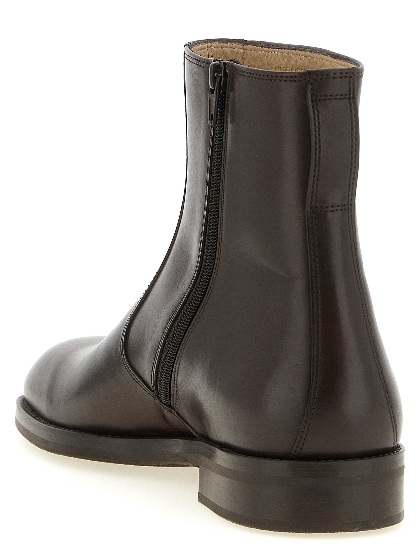 Low-Heel Ankle Boots by Lemaire for men in lamb leather brown showcases a impeccable silhouette as Men's Lamb Leather Low-Heel Ankle Boots, artfully defined by a impeccable low-heel and a impeccable square toe style.