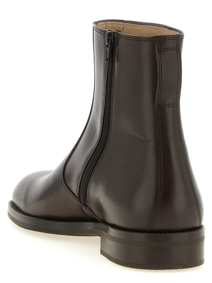 Low-Heel Ankle Boots by Lemaire for men in lamb leather brown showcases a impeccable silhouette as Men's Lamb Leather Low-Heel Ankle Boots, artfully defined by a impeccable low-heel and a impeccable square toe style.