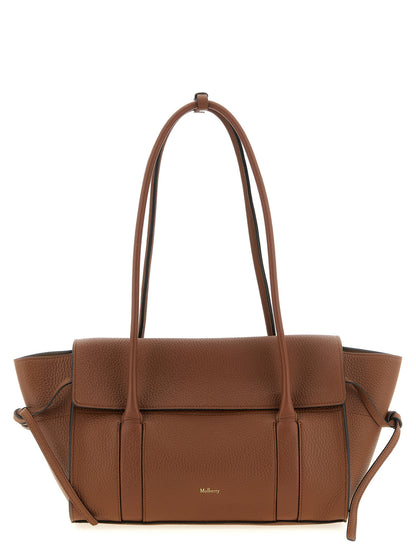 Small Shoulder Flap Bag by Mulberry for women in calfskin leather brown & gold features a effortless chic silhouette with a secure flap, ample , and versatile shoulder-strap & handle for a effortless chic finish.