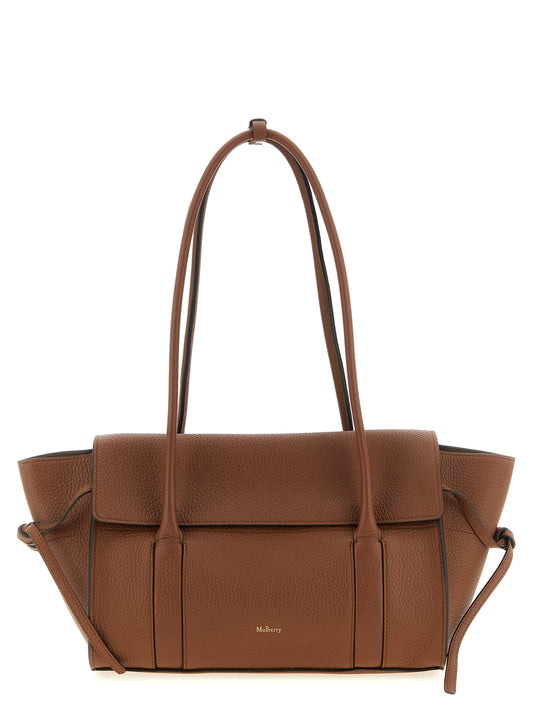 Small Shoulder Flap Bag by Mulberry for women in calfskin leather brown & gold features a effortless chic silhouette with a secure flap, ample , and versatile shoulder-strap & handle for a effortless chic finish.