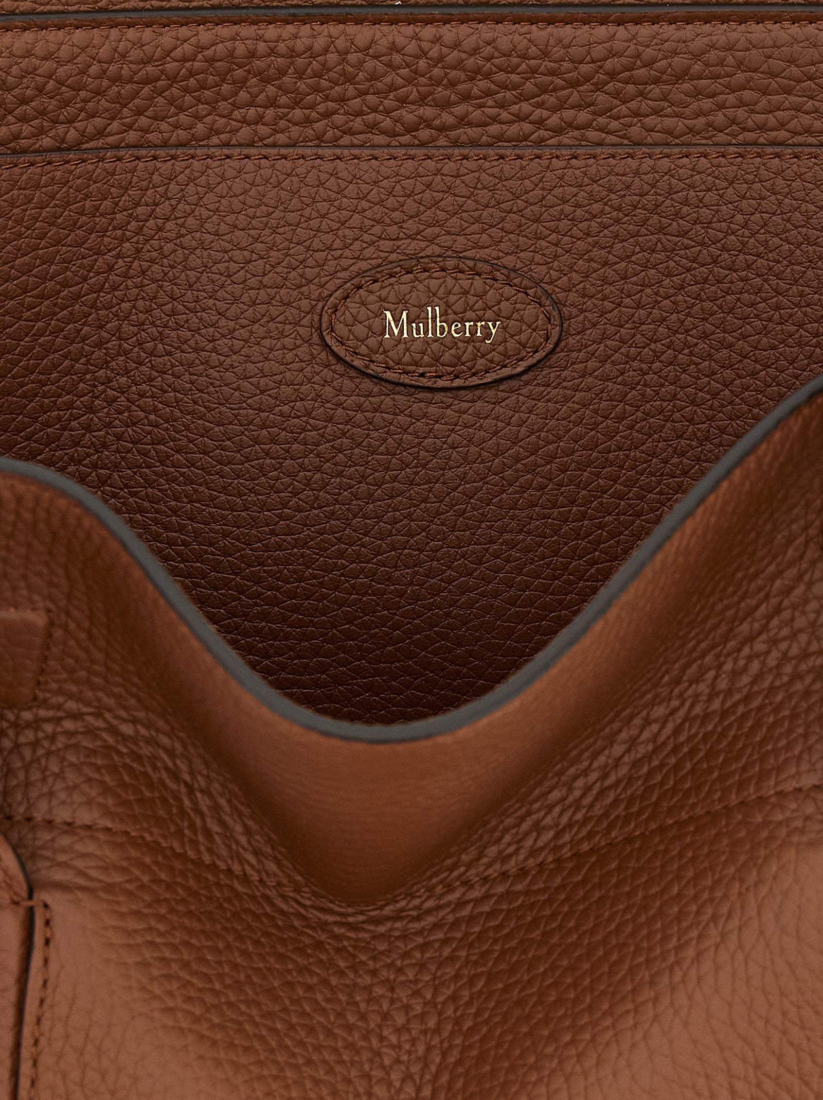 Small Shoulder Flap Bag by Mulberry for women in calfskin leather brown & gold presents a versatile silhouette, showcasing a secure flap and versatile with versatile shoulder-strap & handle for a sophisticated look.