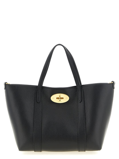 Mni Tote Bag by Mulberry for women in calfskin leather black, gold & signature features an metropolitan chic Icon Calfskin Leather Mni Tote Bag design with a secure , metropolitan chic , and versatile shoulder-strap, handle & adjustable-strap for a metropolitan chic look.