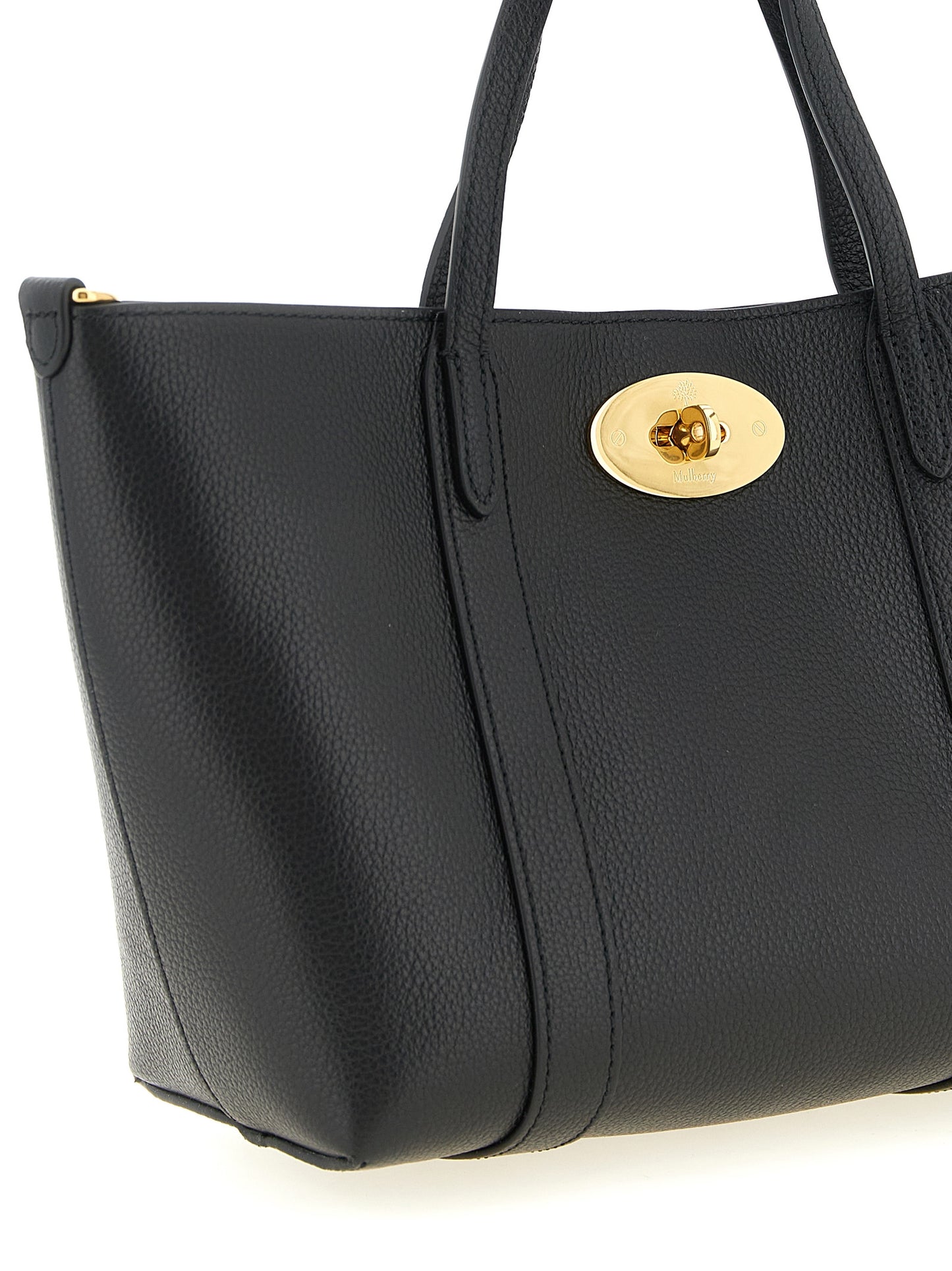 Mni Tote Bag by Mulberry for women in calfskin leather black, gold & signature features a distinguished Icon Calfskin Leather Mni Tote Bag design, complete with a secure , ample , and versatile shoulder-strap, handle & adjustable-strap for a distinguished look.