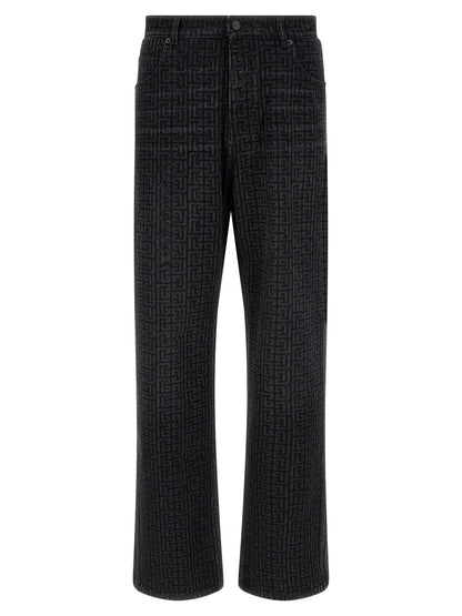 Jeans by Balmain for men in denim cotton black, patterned & monogram features a polished silhouette with a polished straight-leg, reaching a polished long and finished with a polished .