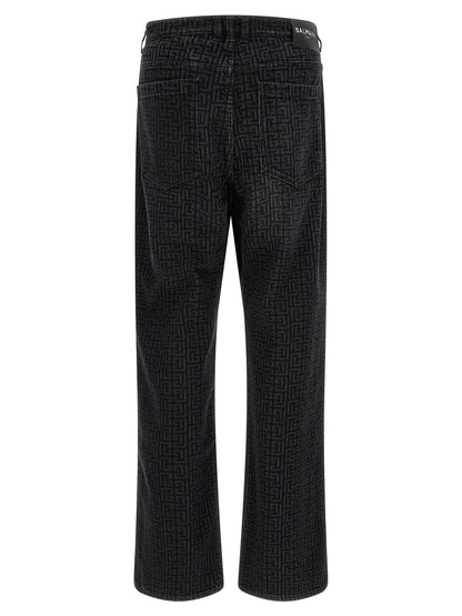 Jeans by Balmain for men in denim cotton black, patterned & monogram features a refined silhouette with a refined straight-leg, defined by a and a refined long for a refined finish.