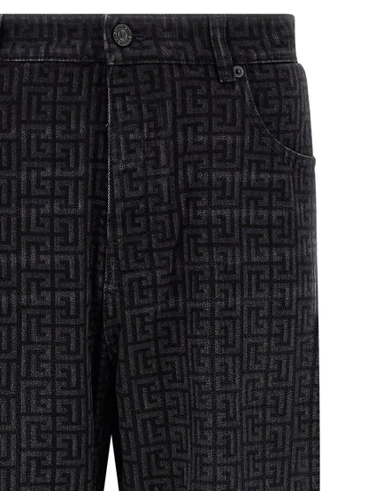 Jeans by Balmain for men in denim cotton black, patterned & monogram presents a refined pantology silhouette, artfully defined by a refined pantology straight-leg, long, and a sophisticated .