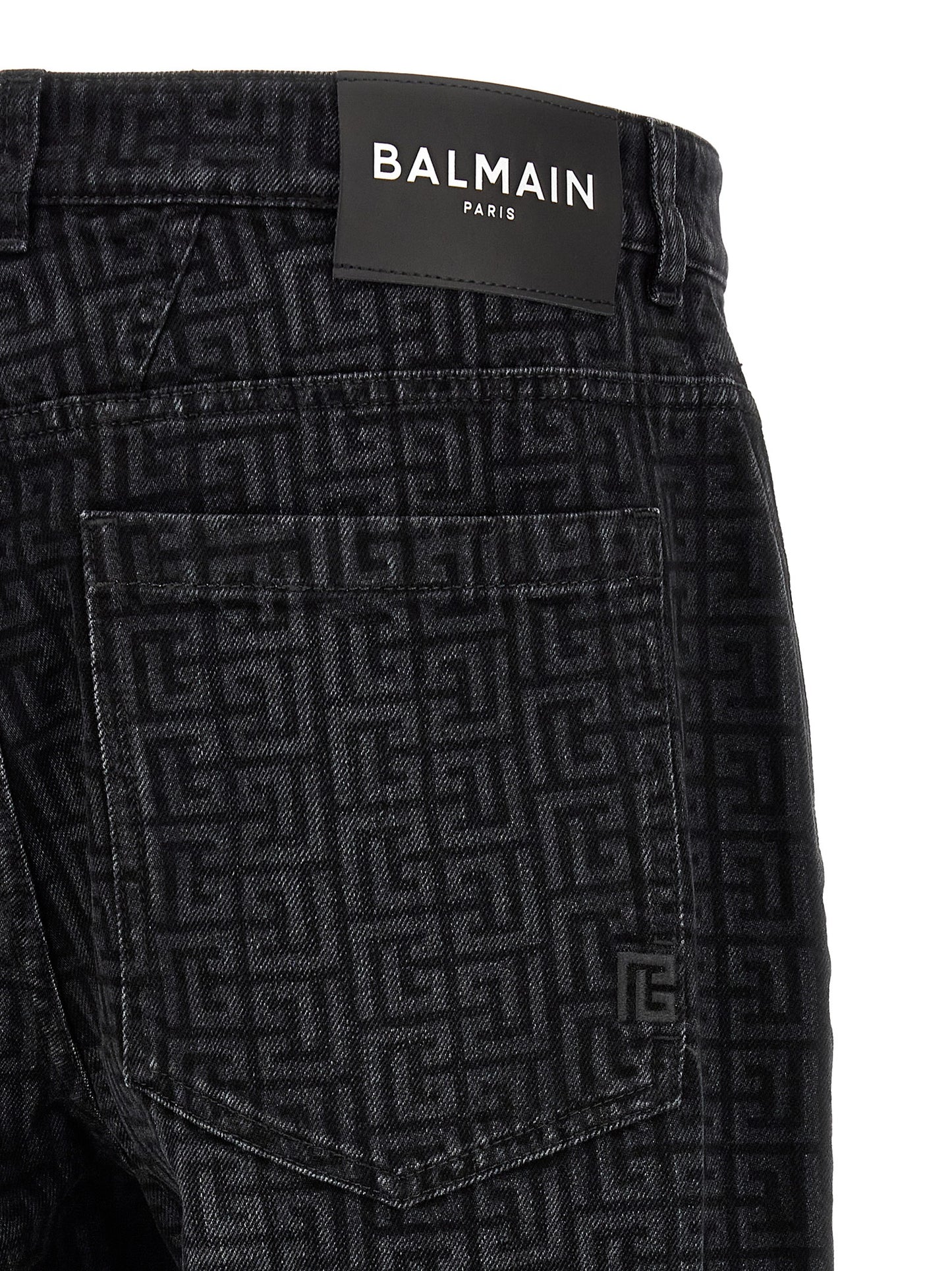 Jeans by Balmain for men in denim cotton black, patterned & monogram features an sophisticated and straight-leg with a precise long, creating a sophisticated and sophisticated silhouette.