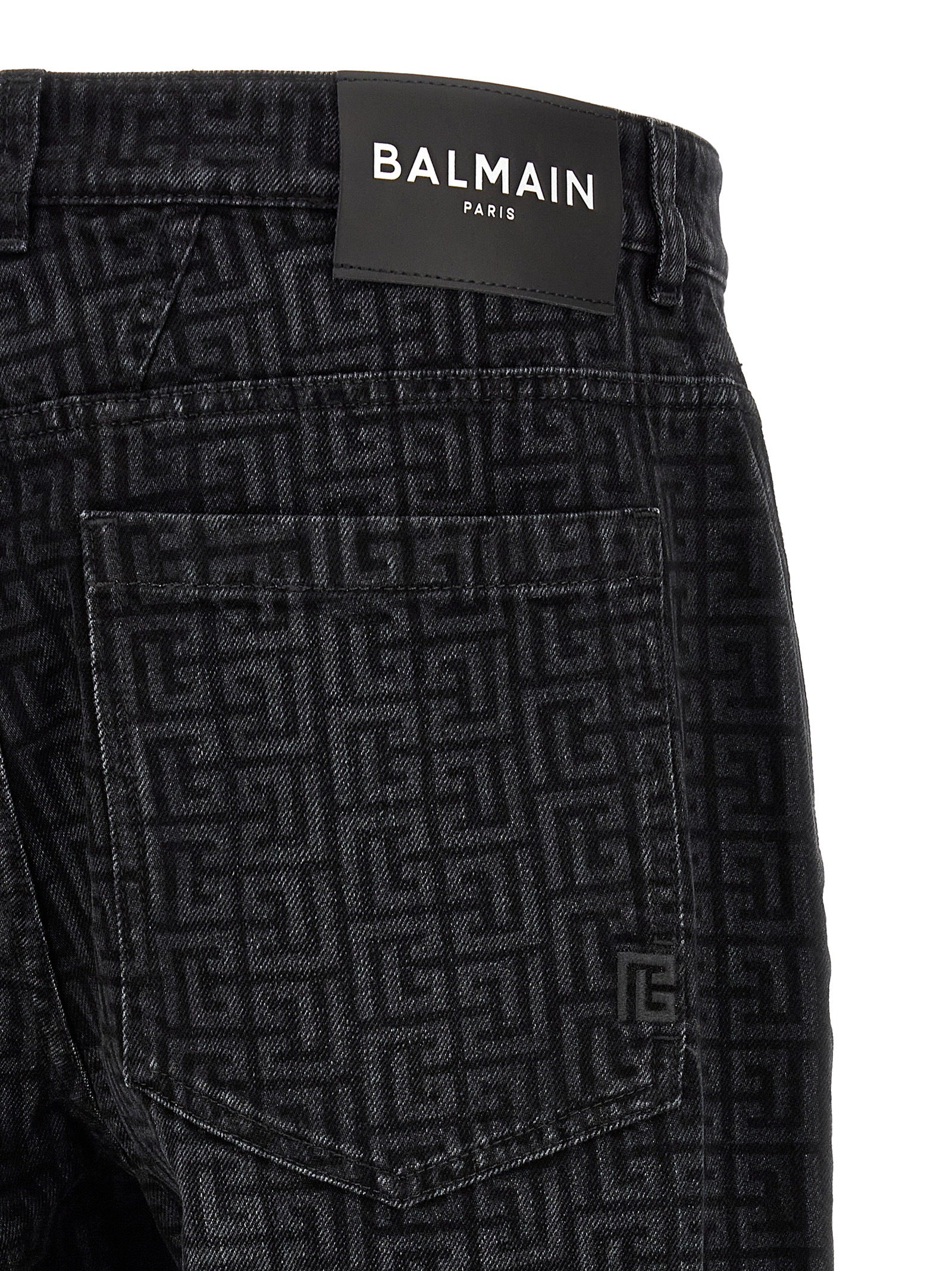 Jeans by Balmain for men in denim cotton black, patterned & monogram features an sophisticated and straight-leg with a precise long, creating a sophisticated and sophisticated silhouette.