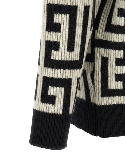 Cardigan by Balmain for men in cashmere merino wool & goat leather bicolour, black, white & monogram features an impeccable silhouette, showcasing a sophisticated and detail for a truly impeccable finish.