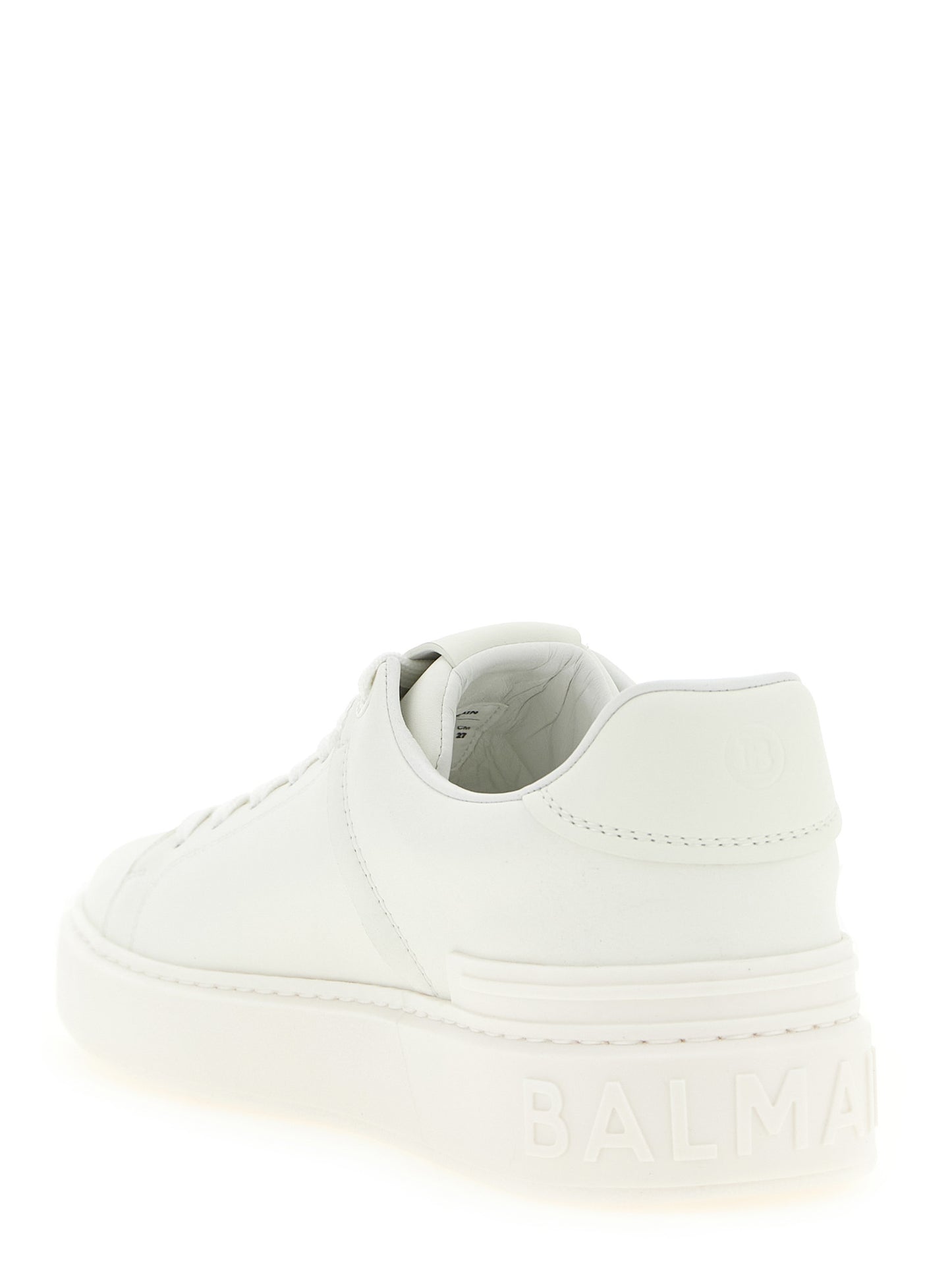 Sneakers by Balmain for men in bos taurus calfskin leather white presents a sumptuous silhouette, artfully capturing the essence of the Men's Low Top Bos Taurus Calfskin Leather Sneakers with its sumptuous low-top style design.