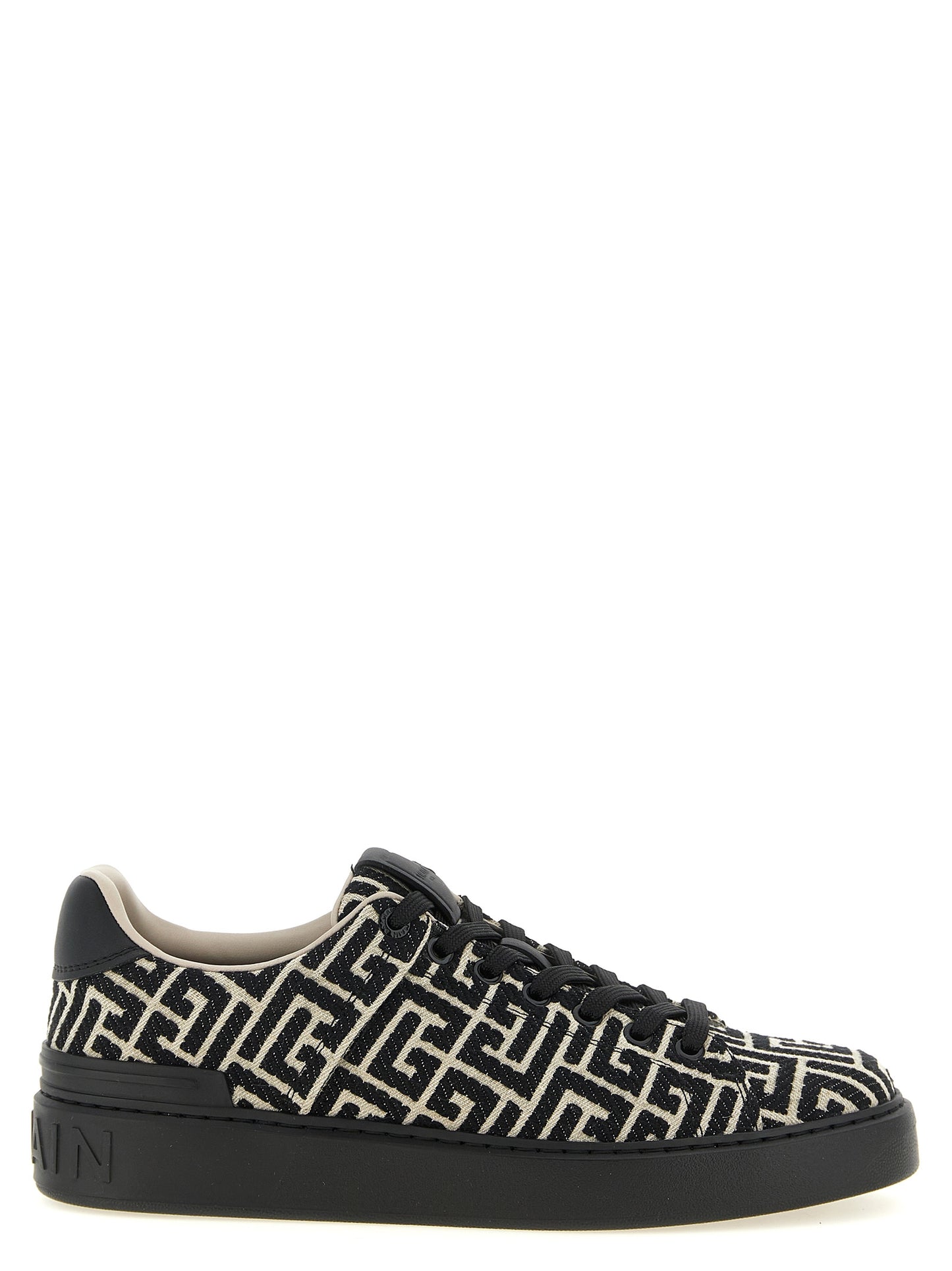 Sneakers by Balmain for men in polyester cotton leather bicolour, beige, black, white, jacquard & monogram features a chic design, perfectly showcasing the chic low-top style of this Men's Low Top Polyester Cotton Leather Sneakers.