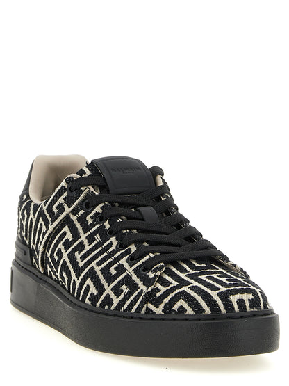 Sneakers by Balmain for men in polyester cotton leather bicolour, beige, black, white, jacquard & monogram presents a impeccable silhouette as Men's Low Top Polyester Cotton Leather Sneakers, expertly defined by a impeccable low-top style for a impeccable, high-fashion look.