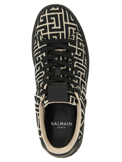 Sneakers by Balmain for men in polyester cotton leather bicolour, beige, black, white, jacquard & monogram presents a impeccable silhouette as Men's Low Top Polyester Cotton Leather Sneakers, expertly defined by a impeccable low-top style for a impeccable, high-fashion look.