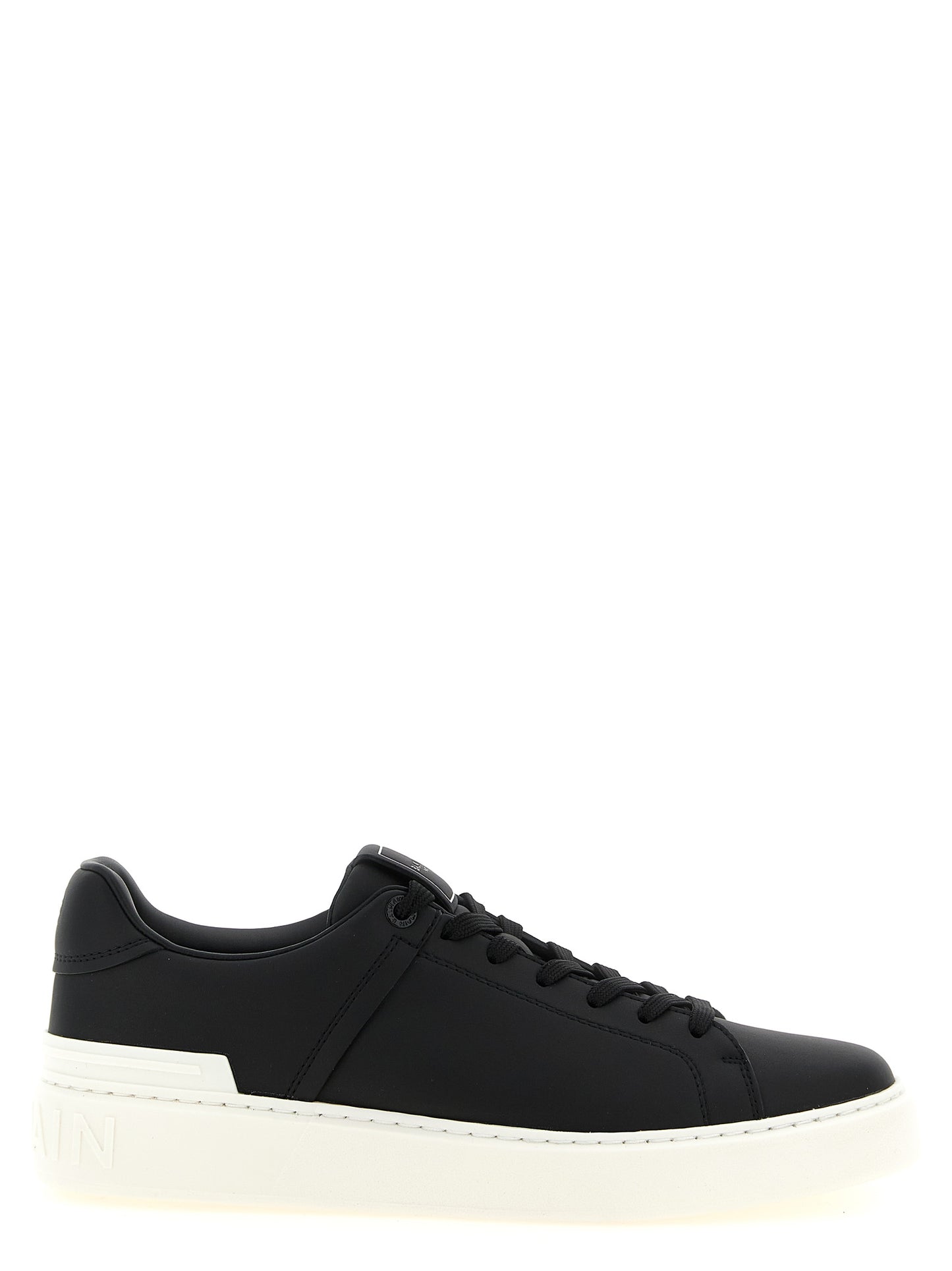Sneakers by Balmain for men in calfskin leather bicolour, black & white presents a impeccable silhouette as Men's Low Top Calfskin Leather Sneakers, expertly defined by a impeccable low-top style for a impeccable, high-fashion look.