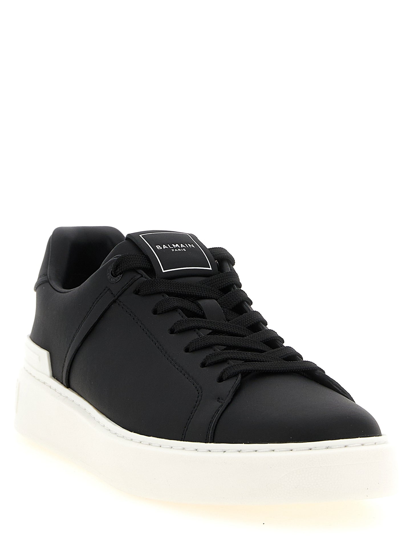 Sneakers by Balmain for men in calfskin leather bicolour, black & white features a chic design, perfectly showcasing the chic low-top style of this Men's Low Top Calfskin Leather Sneakers.
