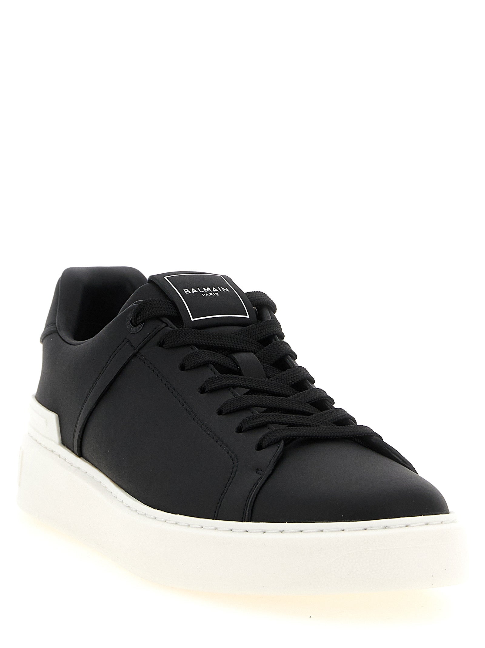 Sneakers by Balmain for men in calfskin leather bicolour, black & white features a chic design, perfectly showcasing the chic low-top style of this Men's Low Top Calfskin Leather Sneakers.