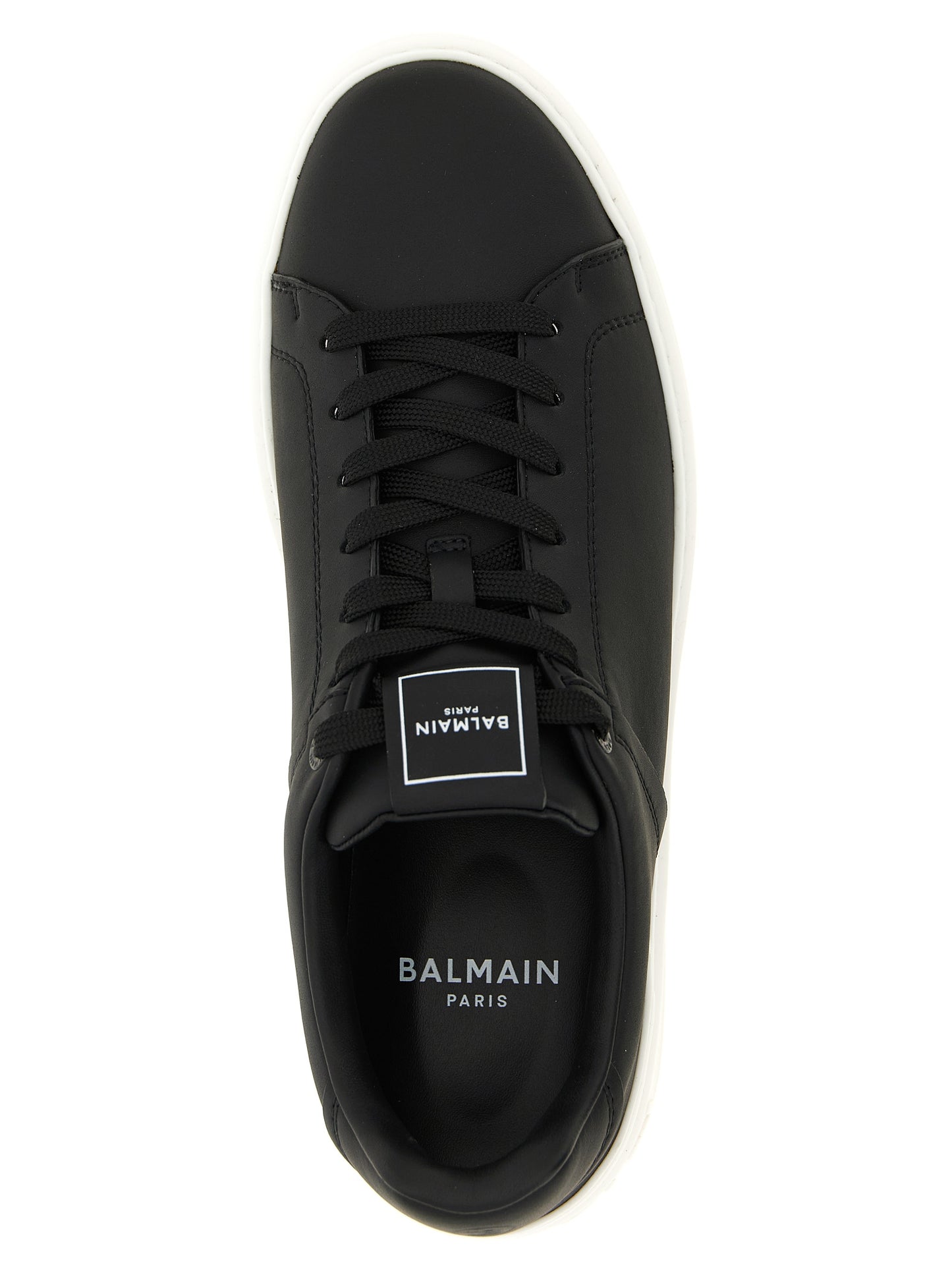 Sneakers by Balmain for men in calfskin leather bicolour, black & white features an fashionable silhouette, showcasing the premium Men's Low Top Calfskin Leather Sneakers in a fashionable low-top style that offers a fashionable finish for refined style.