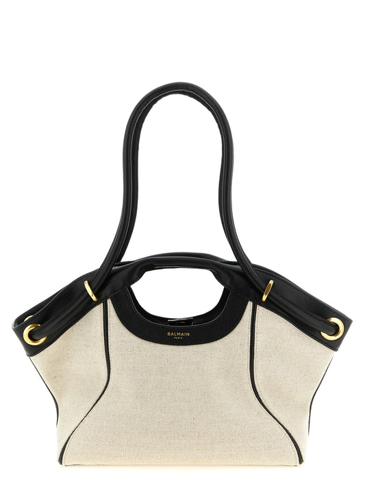 Shopper Tote Clutch Bag by Balmain for women in linen cotton & leather bicolour, black, gold & white features a distinguished Linen Cotton & Leather Shopper Tote Clutch Bag design, complete with a secure snap, ample , and versatile handle & adjustable-strap for a distinguished look.