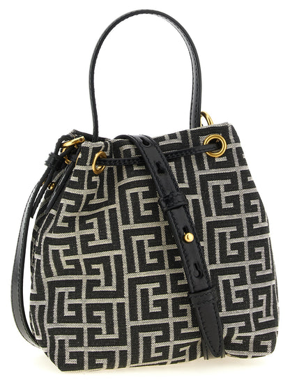 This Mini Bucket Handbag by Balmain for women in leather & polyester cotton and bicolour, black, gold, white, jacquard & monogram presents a sculptural silhouette featuring a secure , ample , and versatile adjustable-strap for a sculptural finish.