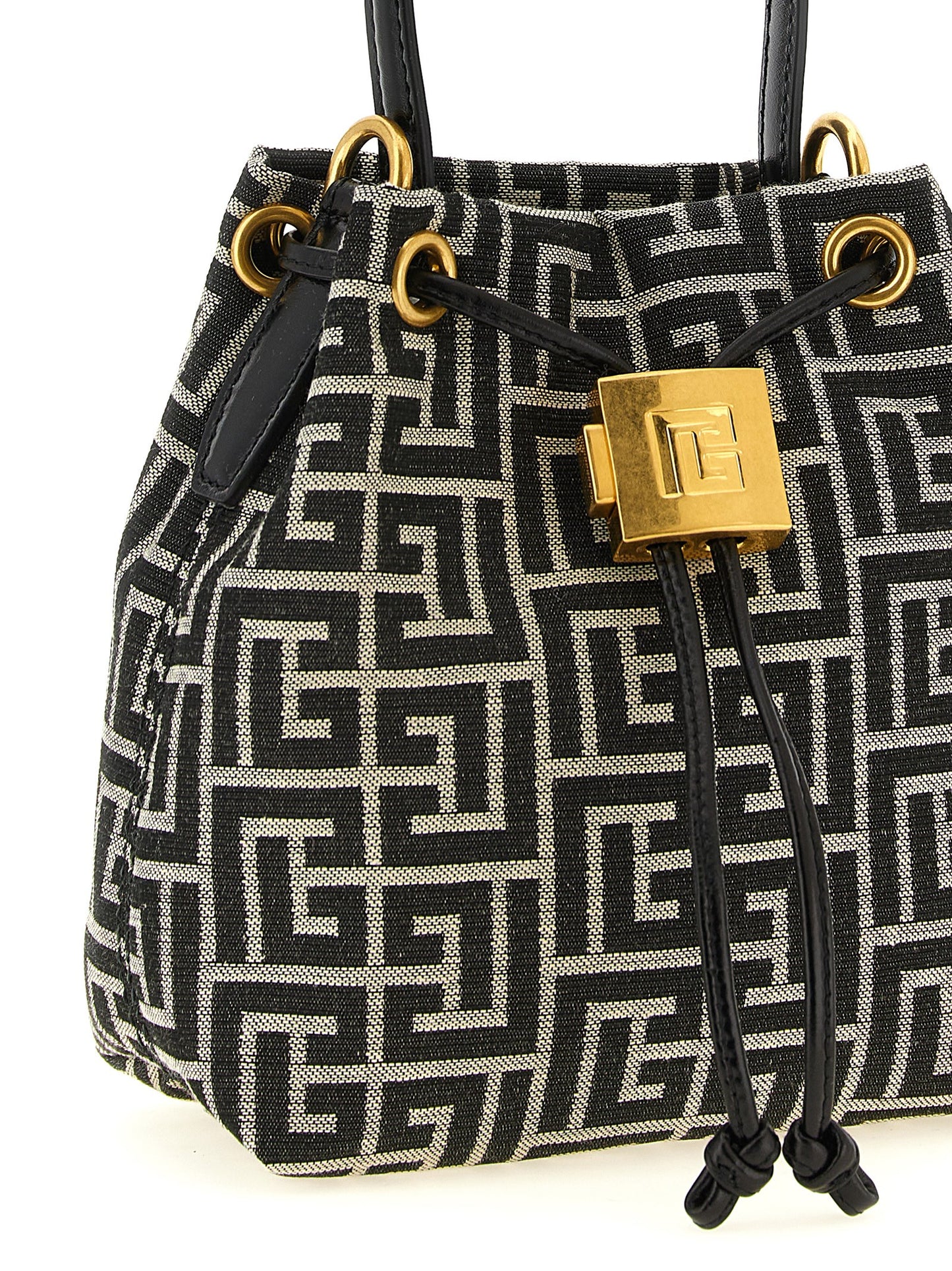 Mini Bucket Handbag by Balmain for women in leather & polyester cotton bicolour, black, gold, white, jacquard & monogram features a contemporary silhouette, showcasing a secure , ample , and contemporary adjustable-strap for a sophisticated look.