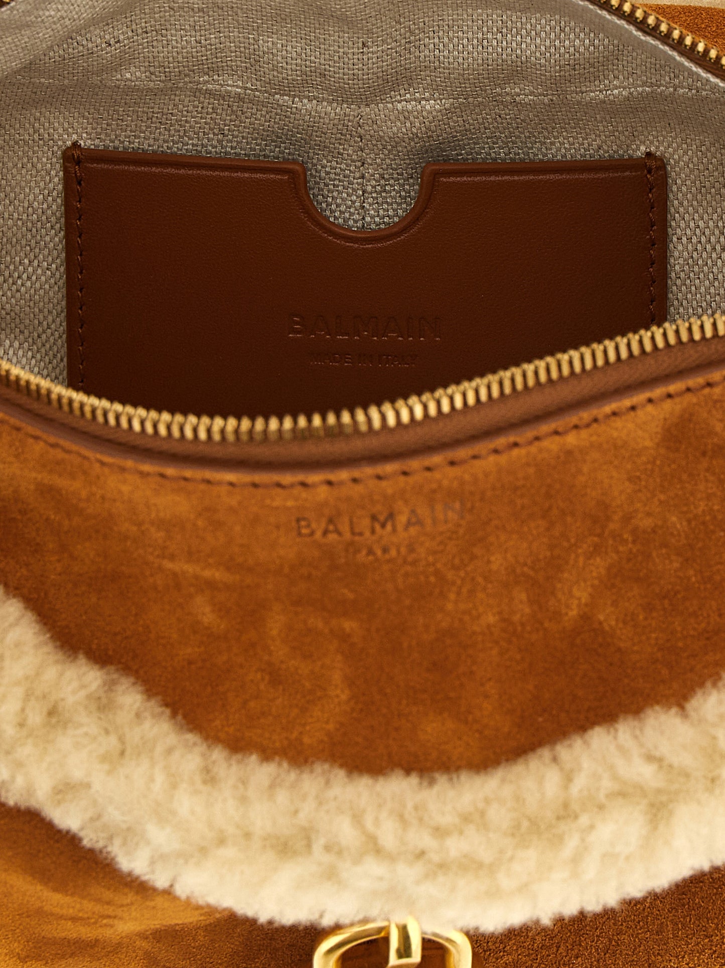Small Shoulder Bag by Balmain for women in bos taurus calfskin leather & canvas brown & gold features a effortless sophistication silhouette, secured by a with ample and versatile shoulder-strap for a effortless sophistication finish.
