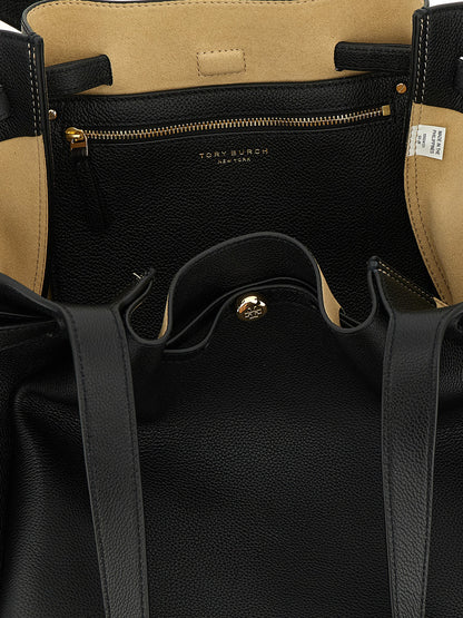 Tote Bag by Tory Burch for women in bos taurus cowhide leather black & gold features an metropolitan chic Romy Bos Taurus Cowhide Leather Tote Bag design with a secure zipper, metropolitan chic , and versatile handle for a metropolitan chic look.