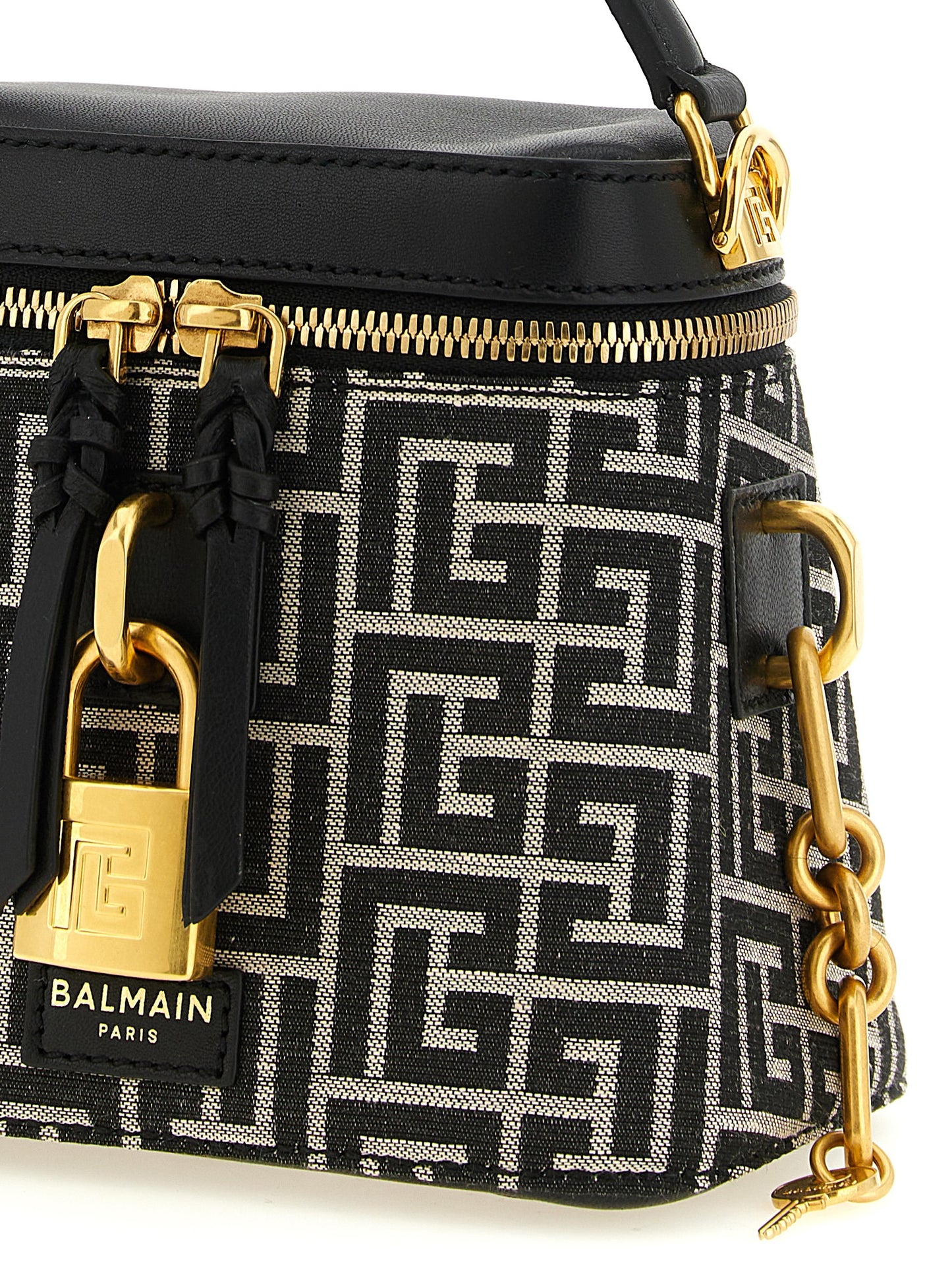 Vanity Handbag by Balmain for women in poly cotton canvas & leather bicolour, black, gold, ivory, white, jacquard & monogram features an refined silhouette, showcasing a secure zipper, ample , and versatile for a sophisticated refined aesthetic.