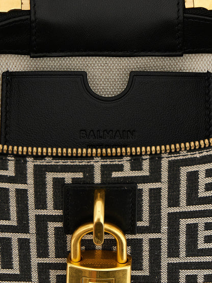 Vanity Handbag by Balmain for women in poly cotton canvas & leather bicolour, black, gold, ivory, white, jacquard & monogram features a signature silhouette, showcasing a secure zipper and signature with versatile for a sophisticated look.