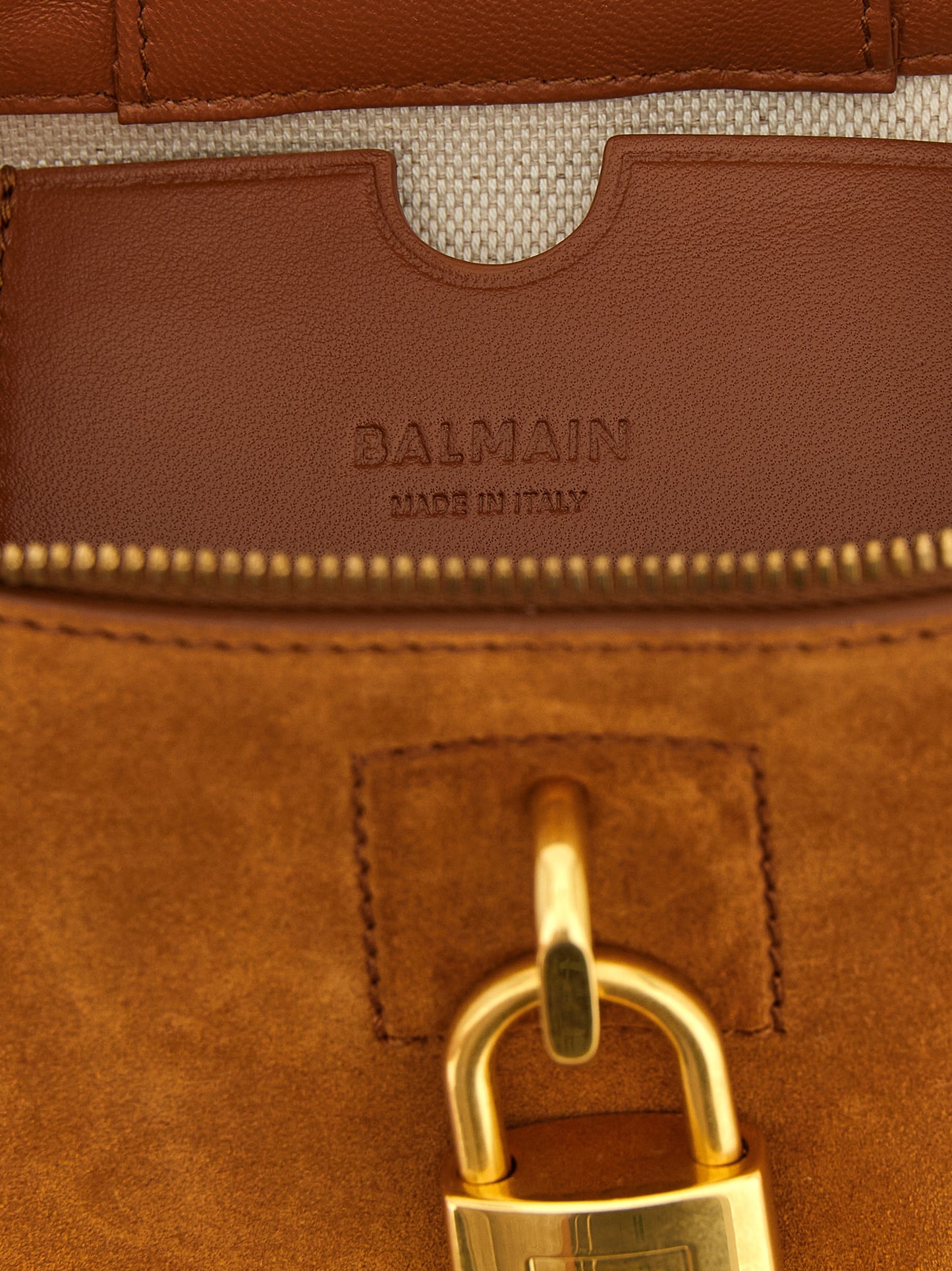 Vanity Handbag by Balmain for women in plush suede calfskin leather brown & gold features a exquisite silhouette, showcasing a secure zipper and exquisite with versatile shoulder-strap & handle for a exquisite finish.