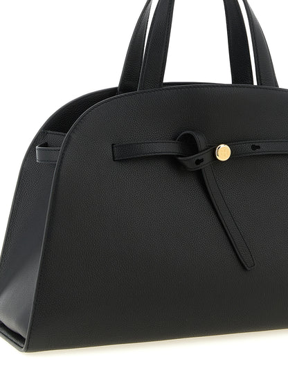 Crossbody Handbag by Tory Burch for women in bos taurus cowhide leather black & gold features an versatile silhouette, showcasing a secure snap, hook & button and versatile with versatile crossbody-strap, shoulder-strap, handle, adjustable-strap & belt-strap for a versatile finish.