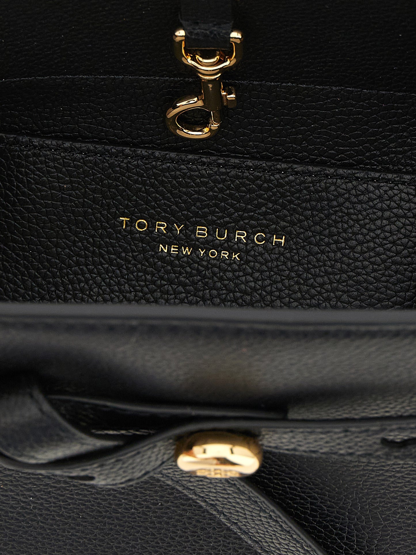 Small Crossbody Handbag by Tory Burch for women in bos taurus cowhide leather black, gold & signature features a transformative elegance silhouette, showcasing a secure , organized , and versatile crossbody-strap, shoulder-strap, adjustable-strap & handle for a transformative elegance look.