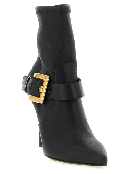 Stiletto Ankle Strap Boots by Balmain for women in calf & lamb leather black & gold features an high-performance silhouette, showcasing the sophisticated design of the Anthem Women's Calf & Lamb Leather Stiletto Ankle Strap Boots with a stiletto and a refined .