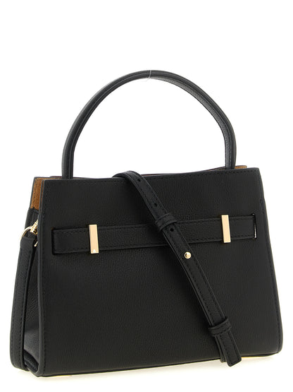 Crossbody Handbag by Tory Burch for women in suede lambskin leather black & gold features an multi-faceted design with a secure magnetic, ample , and versatile crossbody-strap, shoulder-strap & adjustable-strap for a multi-faceted finish.