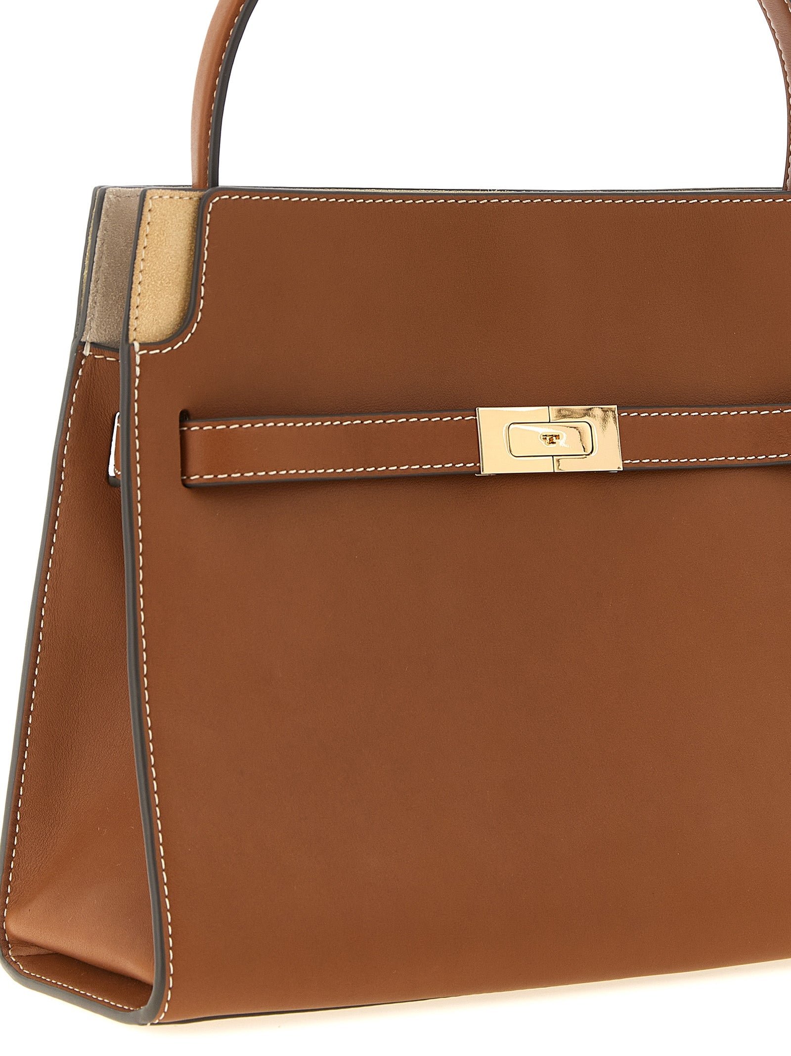 Small Crossbody Handbag by Tory Burch for women in bos taurus suede cowhide leather brown & gold features a transformative elegance silhouette, showcasing a secure , organized , and versatile crossbody-strap, handle & adjustable-strap for a transformative elegance look.