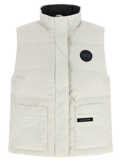 Vest by Canada Goose for women in cotton polyester black & white showcases a utilitarian silhouette, artfully incorporating pockets and a utilitarian high-neck neckline for a truly utilitarian finish.