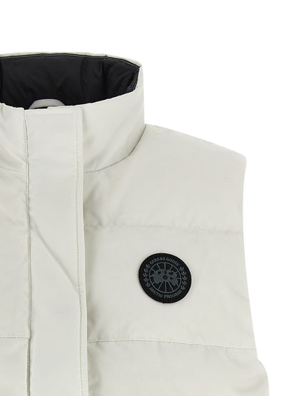 Vest by Canada Goose for women in cotton polyester black & white features a enviable silhouette, elegantly detailed with a enviable high-neck neckline and functional pockets for a enviable finish.