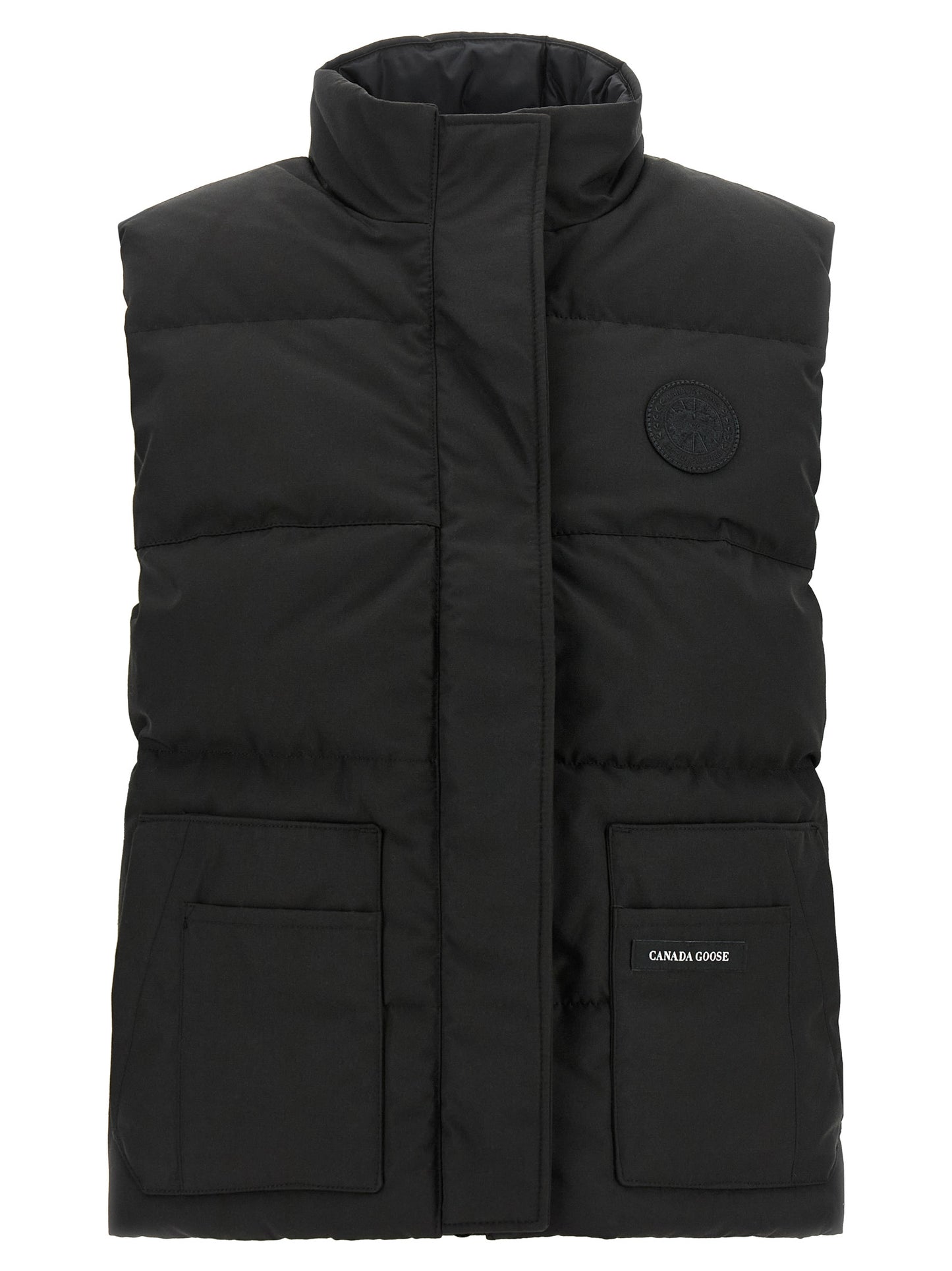 Vest by Canada Goose for women in cotton polyester black features a chic silhouette, expertly detailed with a refined high-neck neckline and premium thermal & pockets for a truly chic look.