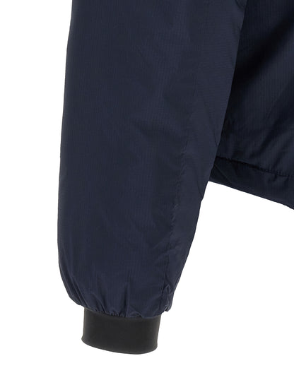 Hooded Overcoat by Canada Goose for men in polyamide navy features an satoral silhouette, showcasing a sophisticated hooded neckline and satoral windproof, lightweight, pockets, hooded & insulated for a premium, timeless look.