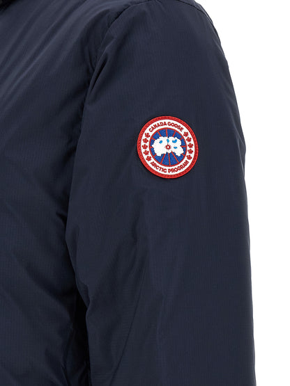 Hooded Overcoat by Canada Goose for men in polyamide navy showcases a architectural silhouette, artfully detailed with a distinctive and functional windproof, lightweight, pockets, hooded & insulated for a architectural finish.