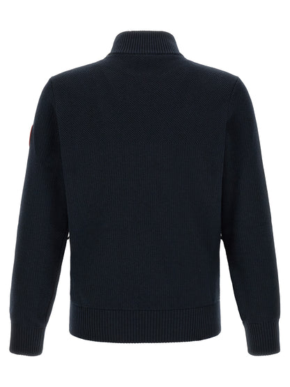 Overcoat by Canada Goose for men in merino wool black & navy presents a luxurious silhouette, showcasing a luxurious and sophisticated thermal, pockets & insulated for a premium, luxurious look.