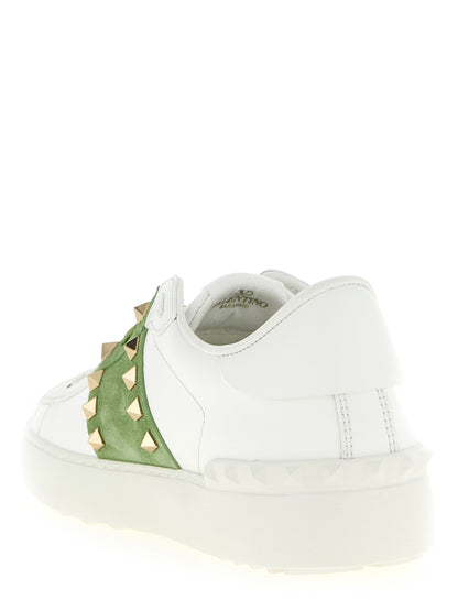 Sneakers by Valentino Garavani for women in calfskin leather bicolour, green, white & signature features an timeless silhouette from the Rockstud Women's Low Top Calfskin Leather Sneakers collection, showcasing a signature low-top style with an timeless finish.